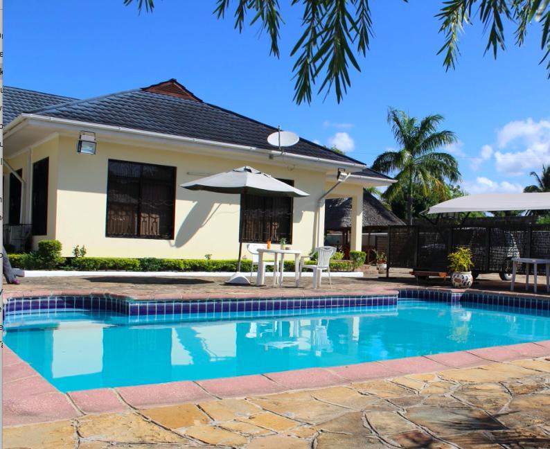 Idc Guest House Багамойо Екстериор снимка